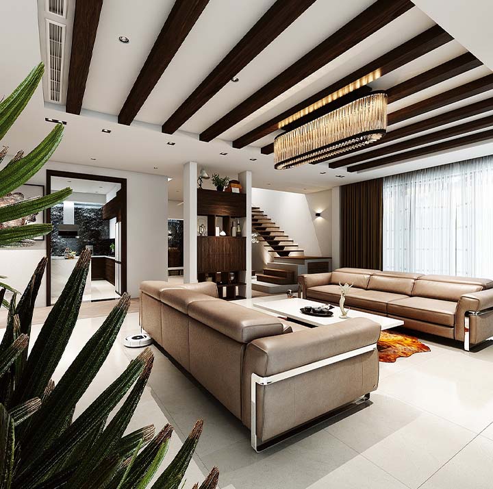 Modern home living room design with two large double-sized sofas and a fancy chandelier light hanging from the ceiling